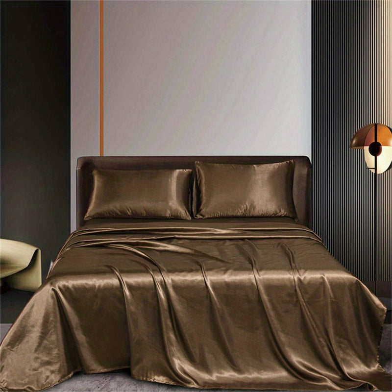 This 4pcs Satin Bed Sheet Set Includes One Fitted Sheet, One Flat Sheet, And Two Pillowcases Without Inserts. The Solid Color Showcases a Simple And Elegant Design That Never Goes Out of Style. Made from Polyester, The Fabric