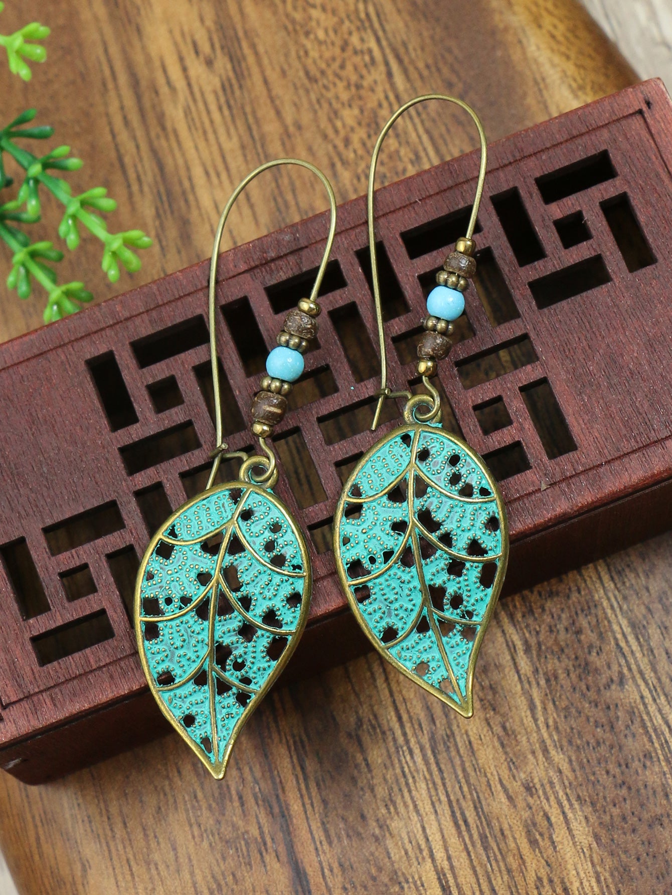 Retro Style Antique Bronze Smeared Blue Leaf Hollow Pendant Large Ear Hook Women's Earrings